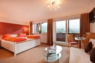 Ein Bett oder Betten in einem Zimmer der Unterkunft Café-Restaurant Bettina