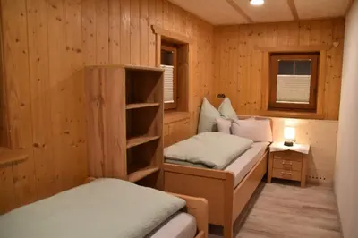 Ein Bett oder Betten in einem Zimmer der Unterkunft Bacherhof