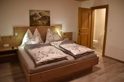Ein Bett oder Betten in einem Zimmer der Unterkunft Bacherhof