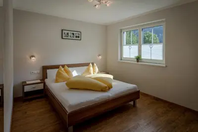 Ein Bett oder Betten in einem Zimmer der Unterkunft Appartements KATHARINA