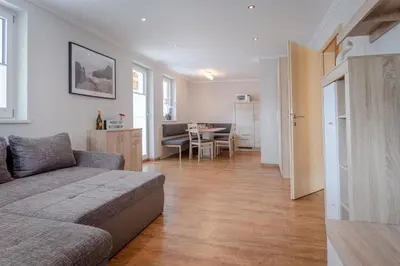 Ein Sitzbereich in der Unterkunft Appartements KATHARINA