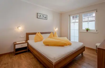 Ein Bett oder Betten in einem Zimmer der Unterkunft Appartements KATHARINA