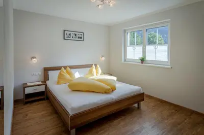 Ein Bett oder Betten in einem Zimmer der Unterkunft Appartements KATHARINA