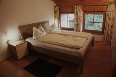 Ein Bett oder Betten in einem Zimmer der Unterkunft Farnreit