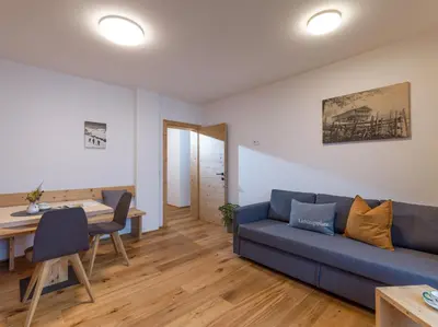 Ein Sitzbereich in der Unterkunft Bauernhof Streitenau