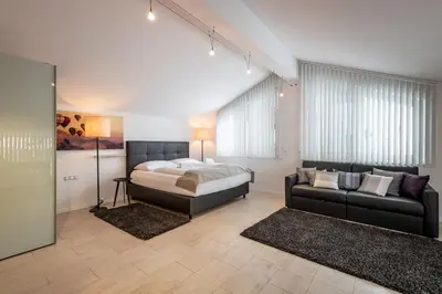 Ein Bett oder Betten in einem Zimmer der Unterkunft Ferienhaus Au Villa