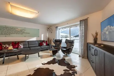 Ein Sitzbereich in der Unterkunft Ferienhaus Au Villa