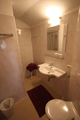 Ein Badezimmer in der Unterkunft Pension Aberger