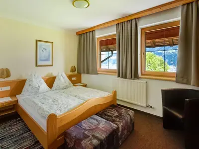 Ein Bett oder Betten in einem Zimmer der Unterkunft Apartment in Fügenberg near Ski Lift