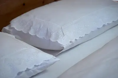 Ein Bett oder Betten in einem Zimmer der Unterkunft Saukaserstub'n Apartments - Ferienwohnung Schützkogel