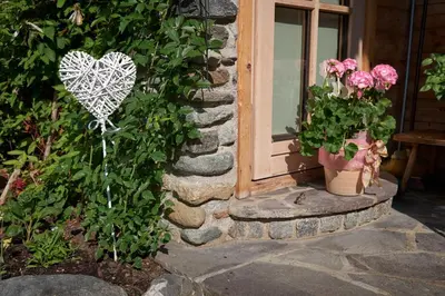 Ein Garten an der Unterkunft Saukaserstub'n Apartments - Ferienwohnung Schützkogel
