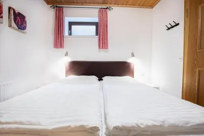 Ein Bett oder Betten in einem Zimmer der Unterkunft Chalet Hochkrimml 49