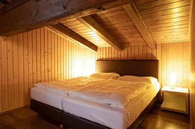 Ein Bett oder Betten in einem Zimmer der Unterkunft Chalet Hochkrimml 49