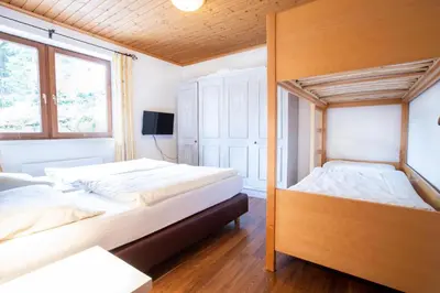 Ein Bett oder Betten in einem Zimmer der Unterkunft Chalet Hochkrimml 49