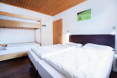 Ein Bett oder Betten in einem Zimmer der Unterkunft Chalet Hochkrimml 49