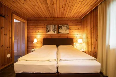 Ein Bett oder Betten in einem Zimmer der Unterkunft Chalet Hochkrimml 49