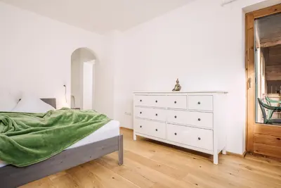 Ein Bett oder Betten in einem Zimmer der Unterkunft Alpenrose