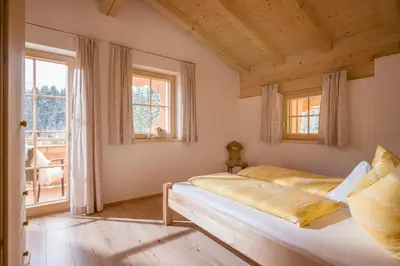 Ein Bett oder Betten in einem Zimmer der Unterkunft Oberfasser
