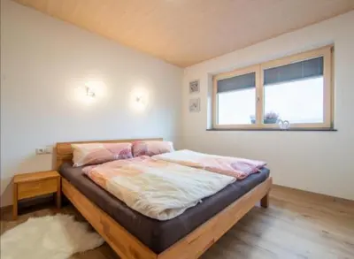 Ein Bett oder Betten in einem Zimmer der Unterkunft Ferienwohnung Kirchler