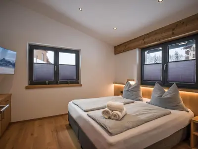 Ein Bett oder Betten in einem Zimmer der Unterkunft Appartement Gaisbergblick