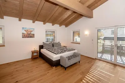 Ein Bett oder Betten in einem Zimmer der Unterkunft Ferienhaus Reiter Jochberg bei Kitzbühel