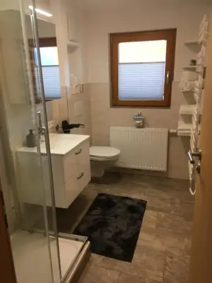 Ein Badezimmer in der Unterkunft Schröckhof
