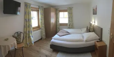 Ein Bett oder Betten in einem Zimmer der Unterkunft Schröckhof