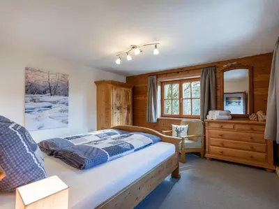 Ein Bett oder Betten in einem Zimmer der Unterkunft Schneiderhof