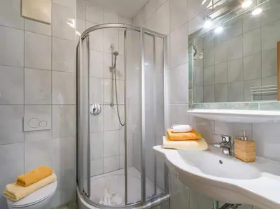 Ein Badezimmer in der Unterkunft Appartementhaus Arbiskogelblick