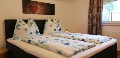 Ein Bett oder Betten in einem Zimmer der Unterkunft Haus Jessica incl National Park Sommercard