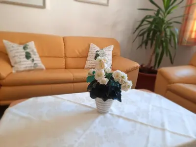 Ein Sitzbereich in der Unterkunft Apartments Kolmblick