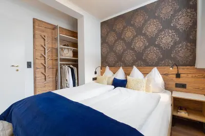 Ein Bett oder Betten in einem Zimmer der Unterkunft Boutique Hotel ANYBODY