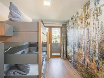 Ein Bett oder Betten in einem Zimmer der Unterkunft Mountain Base Fieberbrunn