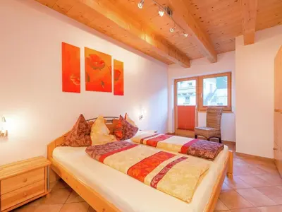 Ein Bett oder Betten in einem Zimmer der Unterkunft Chalet in Krimml near Europe's Highest Waterfall