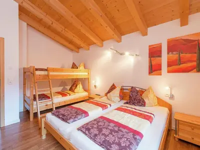Ein Bett oder Betten in einem Zimmer der Unterkunft Chalet in Krimml near Europe's Highest Waterfall