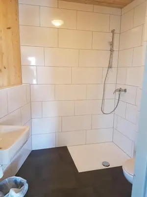 Ein Badezimmer in der Unterkunft Jugendgästehaus Gerlosplatte