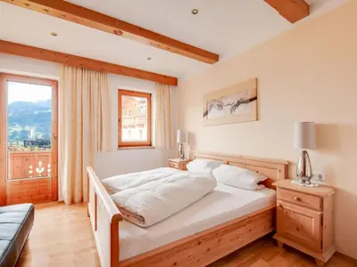 Ein Bett oder Betten in einem Zimmer der Unterkunft Modern vacation apartment with a view