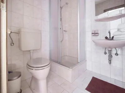 Ein Badezimmer in der Unterkunft Modern vacation apartment with a view