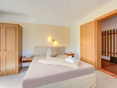 Ein Bett oder Betten in einem Zimmer der Unterkunft Apartment in Hainzenberg near Ski Lift