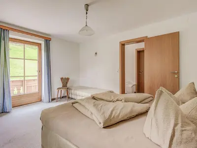 Ein Bett oder Betten in einem Zimmer der Unterkunft Apartment in Hainzenberg near Ski Lift