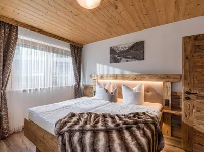 Ein Bett oder Betten in einem Zimmer der Unterkunft Ferienwohnung Knabl