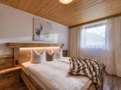 Ein Bett oder Betten in einem Zimmer der Unterkunft Ferienwohnung Knabl