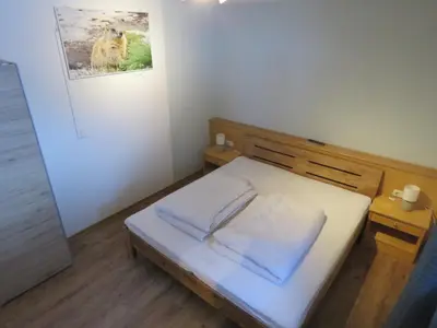 Ein Bett oder Betten in einem Zimmer der Unterkunft Alpenhaus Denver