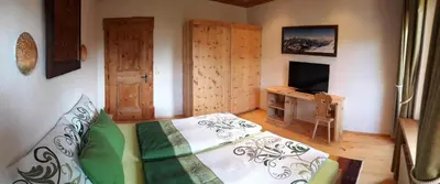 Ein Bett oder Betten in einem Zimmer der Unterkunft Zirbenchalet Obergruben