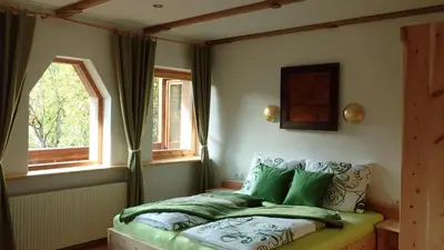 Ein Bett oder Betten in einem Zimmer der Unterkunft Zirbenchalet Obergruben