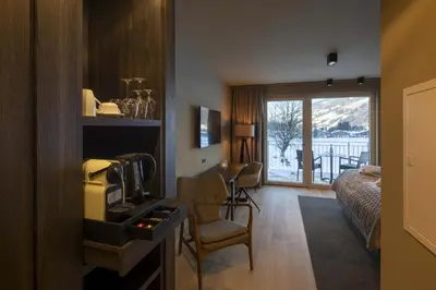 Küche/Küchenzeile in der Unterkunft Berg & Golf Resort Westendorf by ALPS RESORTS