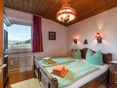 Ein Bett oder Betten in einem Zimmer der Unterkunft Appartement Panoramablick
