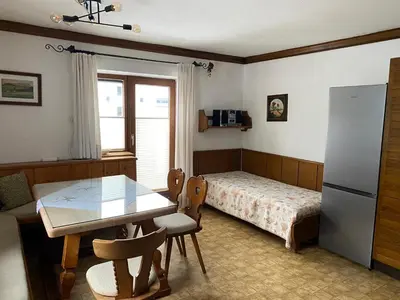Ein Bett oder Betten in einem Zimmer der Unterkunft Haus Jochbergerstrasse 116