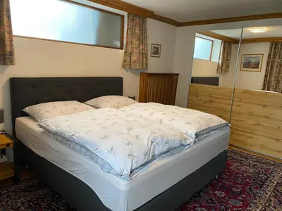Ein Bett oder Betten in einem Zimmer der Unterkunft Haus Jochbergerstrasse 116