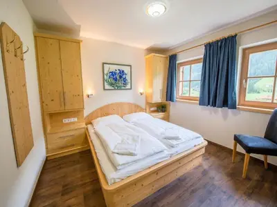 Ein Bett oder Betten in einem Zimmer der Unterkunft Chalet in Austria near Ski Lift & Sauna